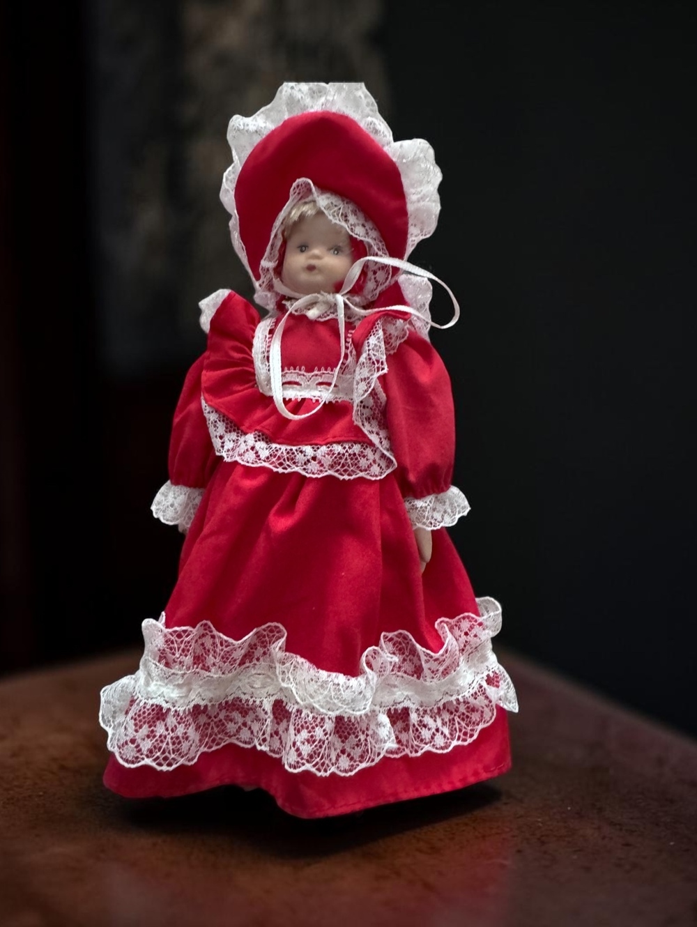 Vintage Porcelain Doll in Red Lace Dress and Bonnet